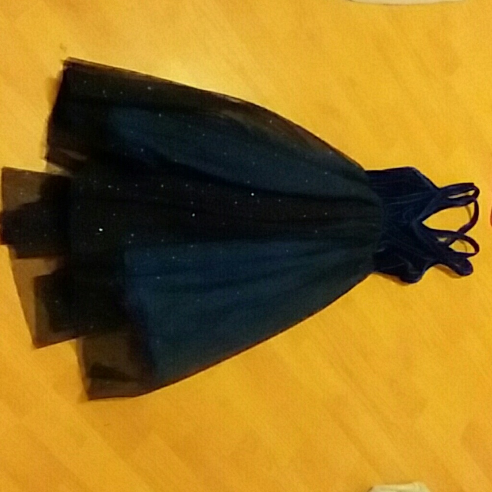 A dress, never worn